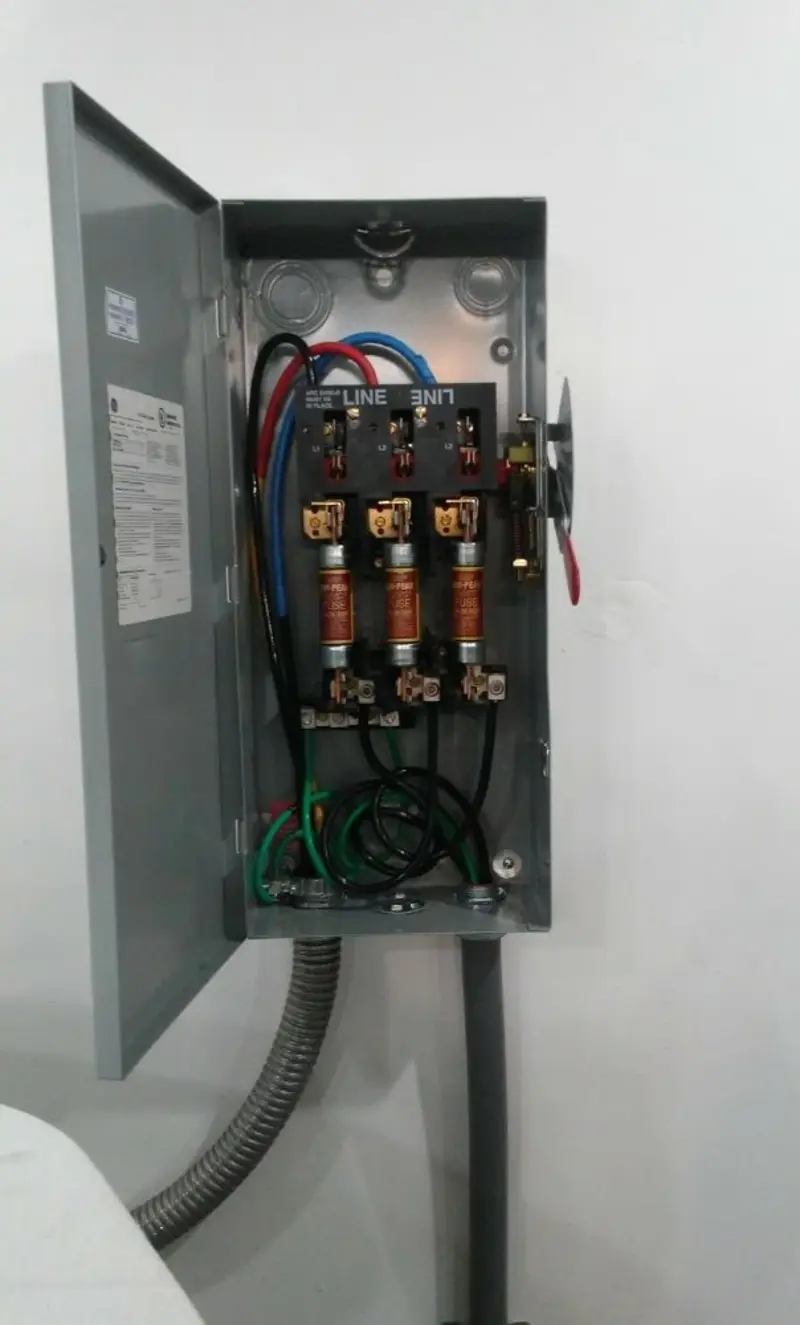 Three-phase disconnect switch installed for Smoke Detector Installation in Hinton