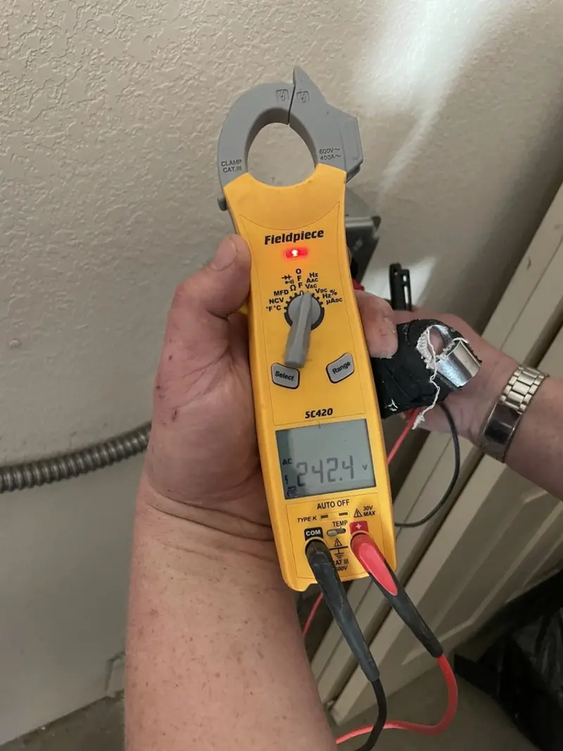 Voltage testing with clamp meter during Hot Tub / Pool Electrical Wiring in Hinton
